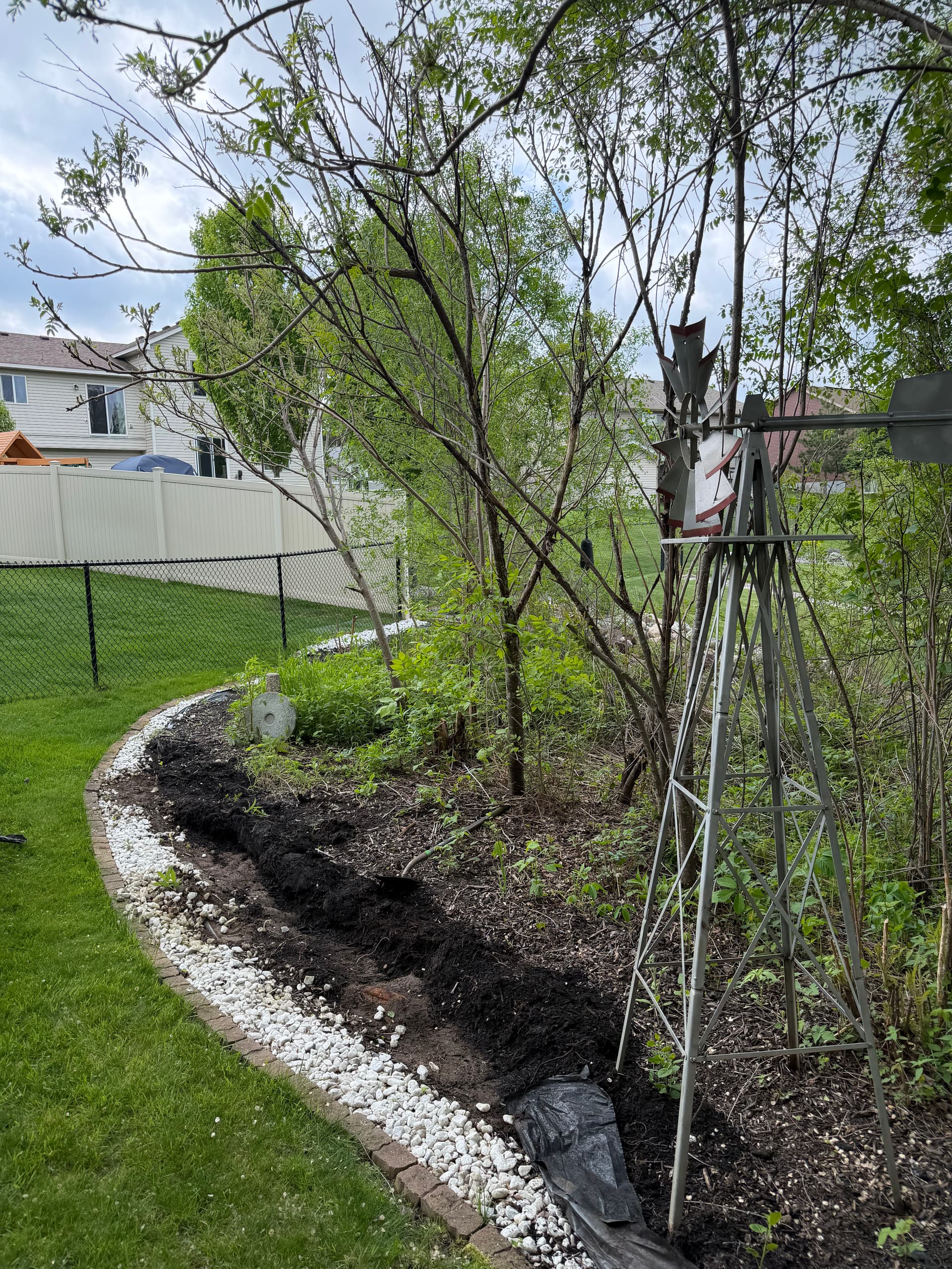 Backyard Rock and Fabric Install That Actually Stays Clean image