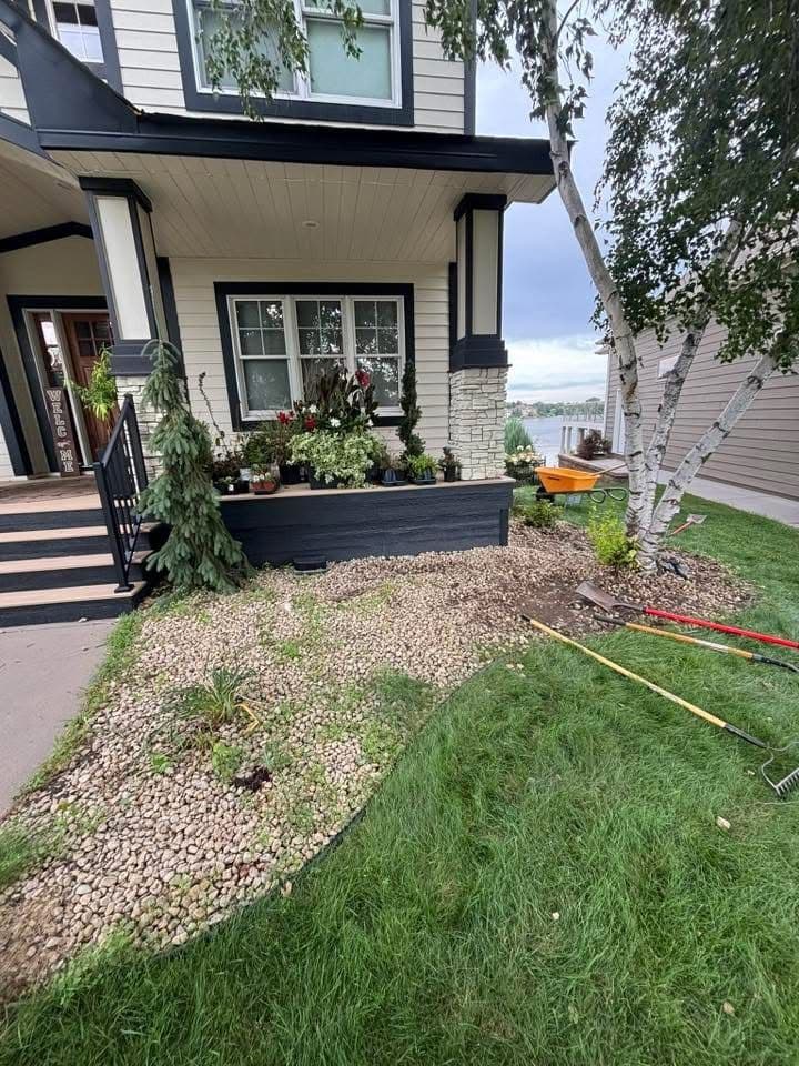 Full Rock Tear-Out and Fresh Landscape Install on a Lakefront Home image