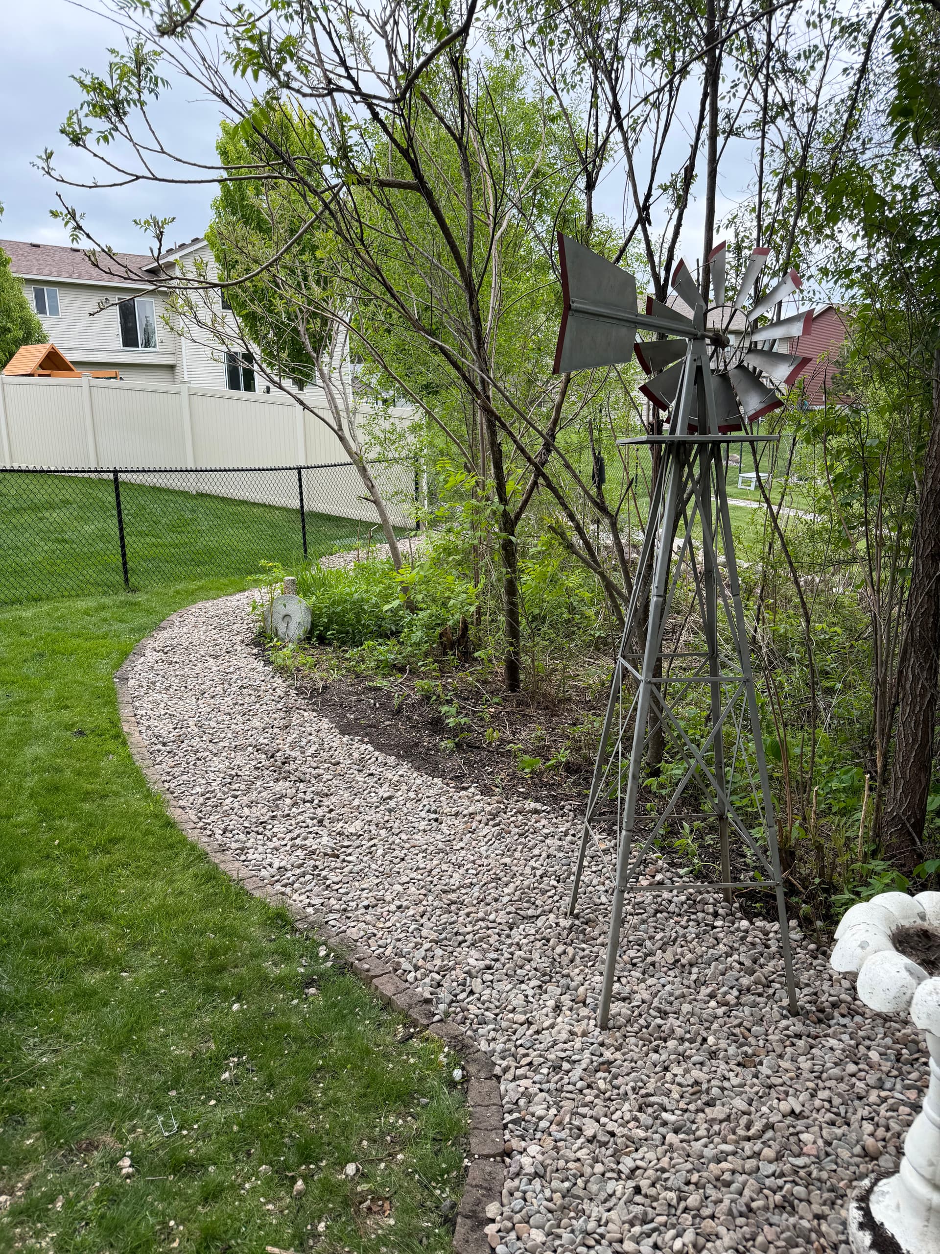 Gallery photos for Backyard Rock and Fabric Install That Actually Stays Clean: Image #1
