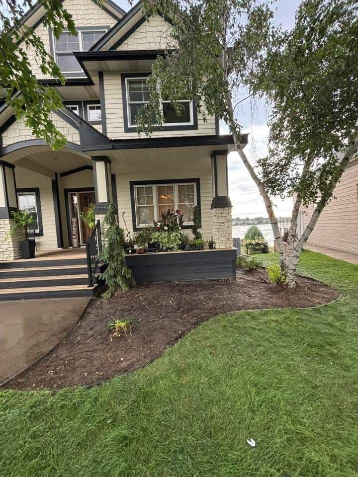 Gallery photos for Full Rock Tear-Out and Fresh Landscape Install on a Lakefront Home: Image #1